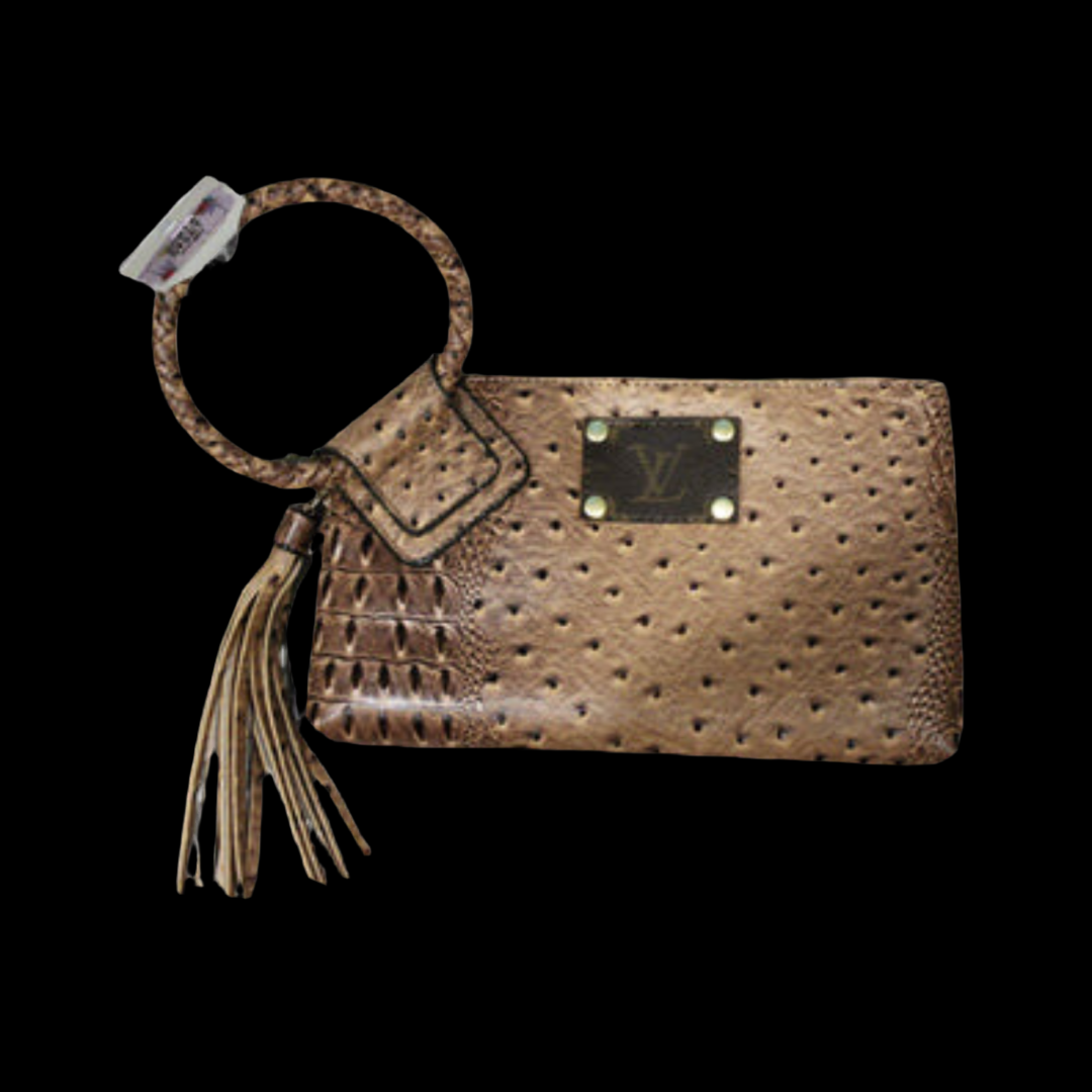 Tasseled and Upcycled Louis Vuitton Wristlet